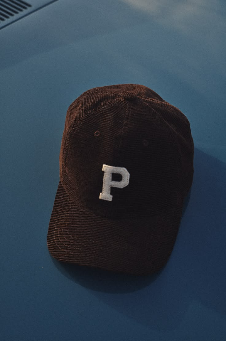 Crown height compared side by side between two caps